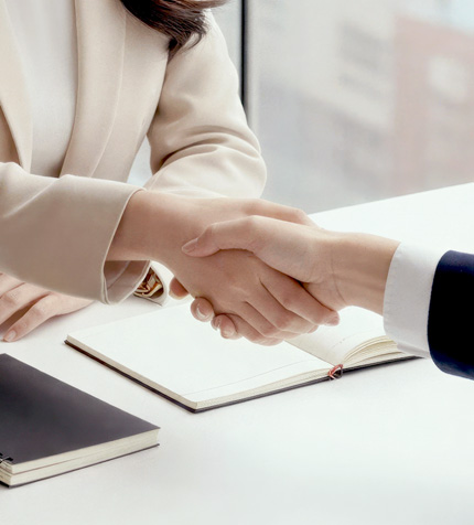 Handshake illustrating client support and collaboration for ongoing website maintenance