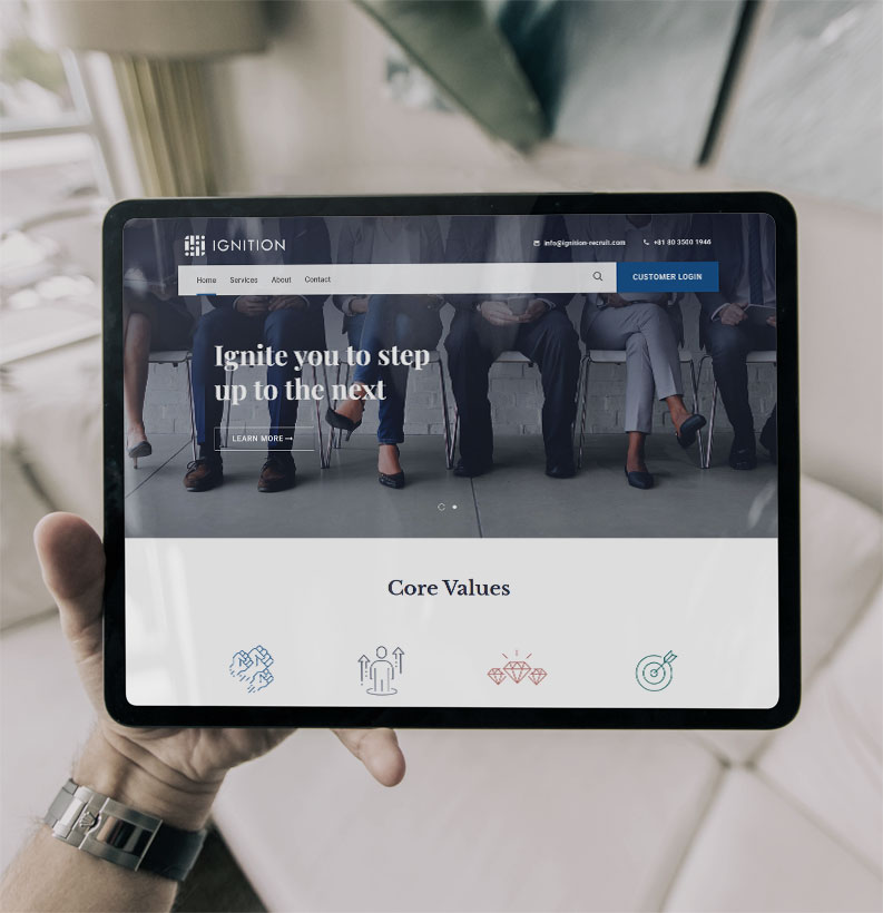 Responsive website displayed on a tablet in a bright indoor setting with warm and neutral tones that create a calm professional mood.