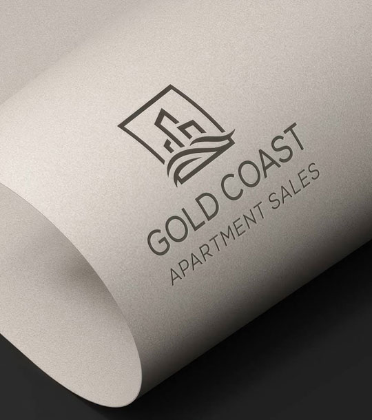 Professional logo design showcased on a textured rolled paper mockup by TMCreation