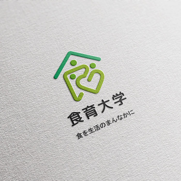 白の質感のある紙に描かれた、緑色の抽象的な和風ロゴ。日本とオーストラリアの感性を掛け合わせた、TMCreationならではのクロスカルチャーなデザイン表現力を象徴する作品。