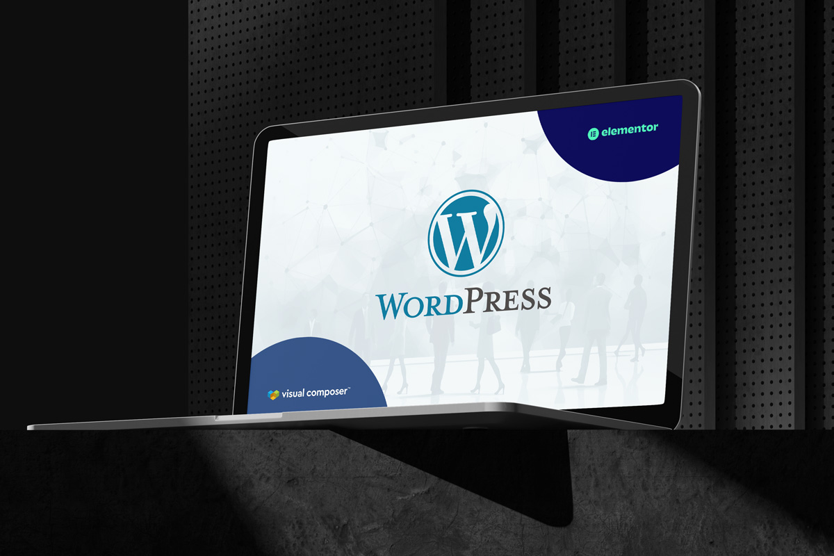 世界標準のCMSであるWordPressのロゴが表示されたノートPC。ビジネスサイト構築において信頼性と拡張性を兼ね備えたプラットフォームであることを象徴するイメージ。